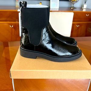 Andre Assous Water resistant patent chelsea boots.